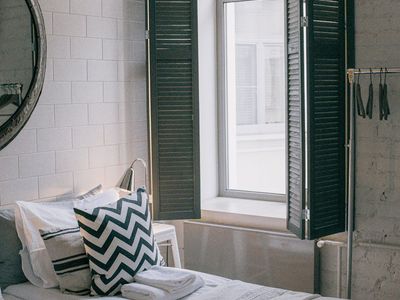 Bright yoga room with sunlight through window